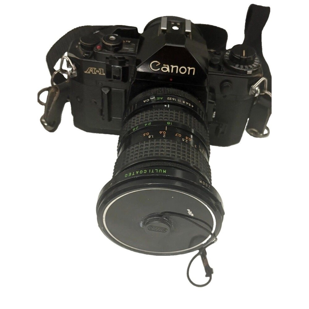 Canon A-1 35mm Film Camera with toyo optics 28mm 1:3.5 Lens and F=28-80  Tested